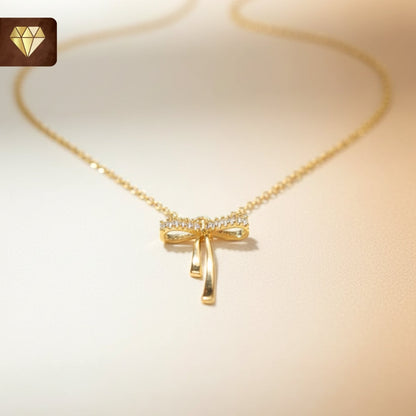 Gold-plated bow pendant necklace with AD (American Diamond) CZ stones for women