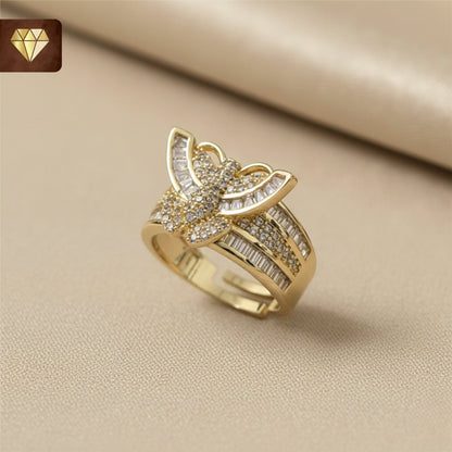 Gold-plated butterfly designer finger ring with baguette and pave AD (American Diamond) CZ stones for women
