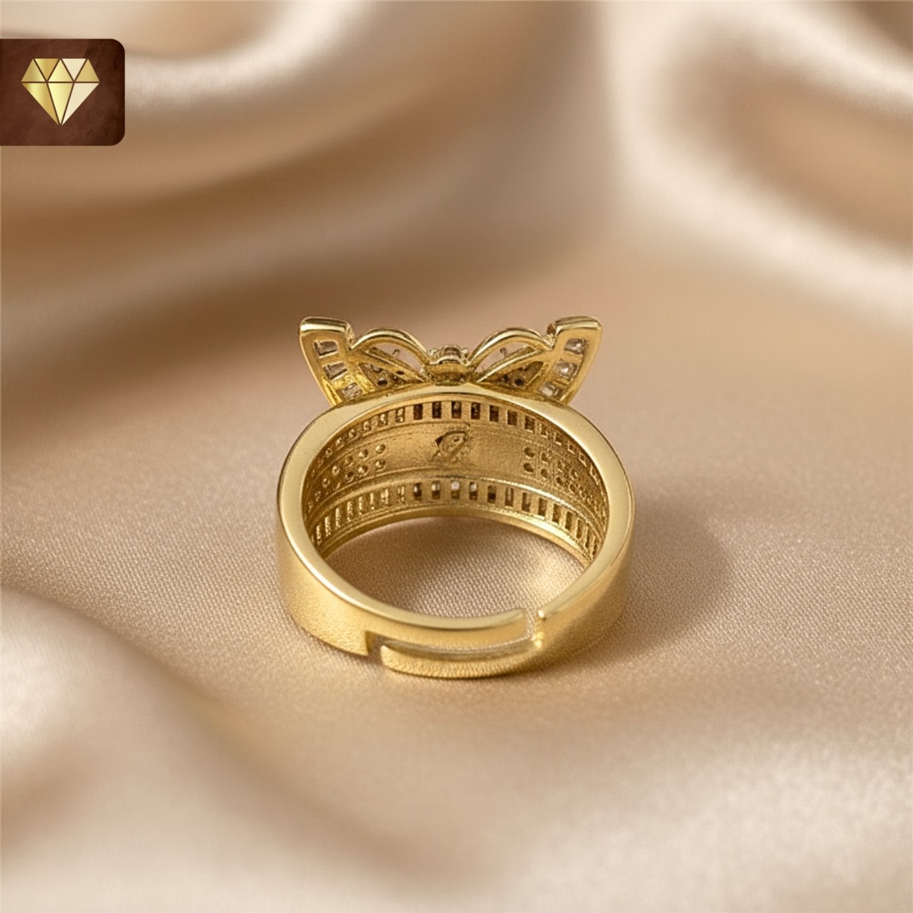 Gold-plated butterfly designer finger ring with baguette and pave AD (American Diamond) CZ stones for women