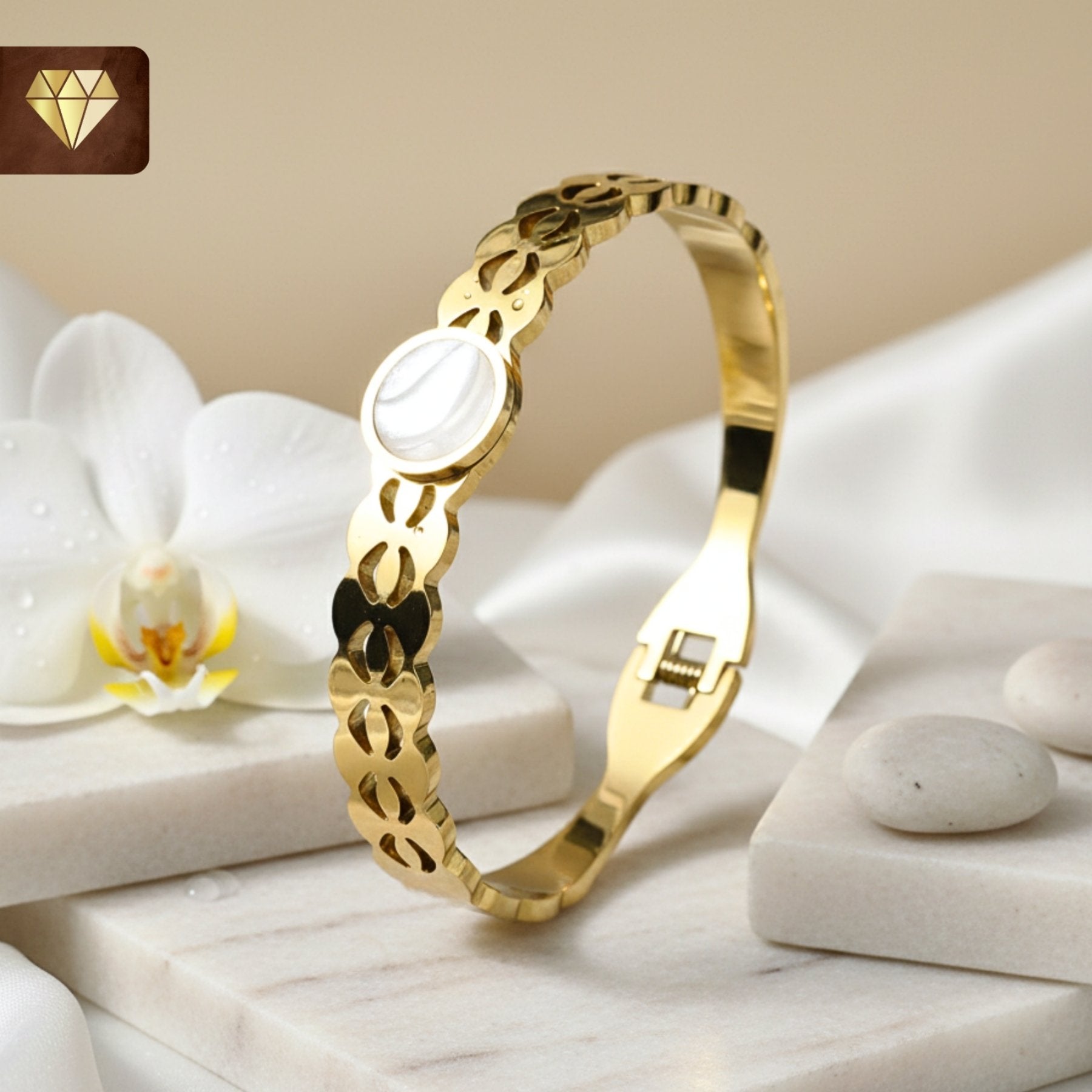 Gold-plated designer cutwork kada bracelet with Mother of Pearl centerpiece for women