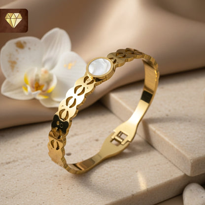Gold-plated designer cutwork kada bracelet with Mother of Pearl centerpiece for women