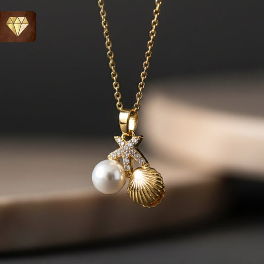 Gold-plated ocean charm pendant necklace with starfish, shell and pearl CZ stones for women