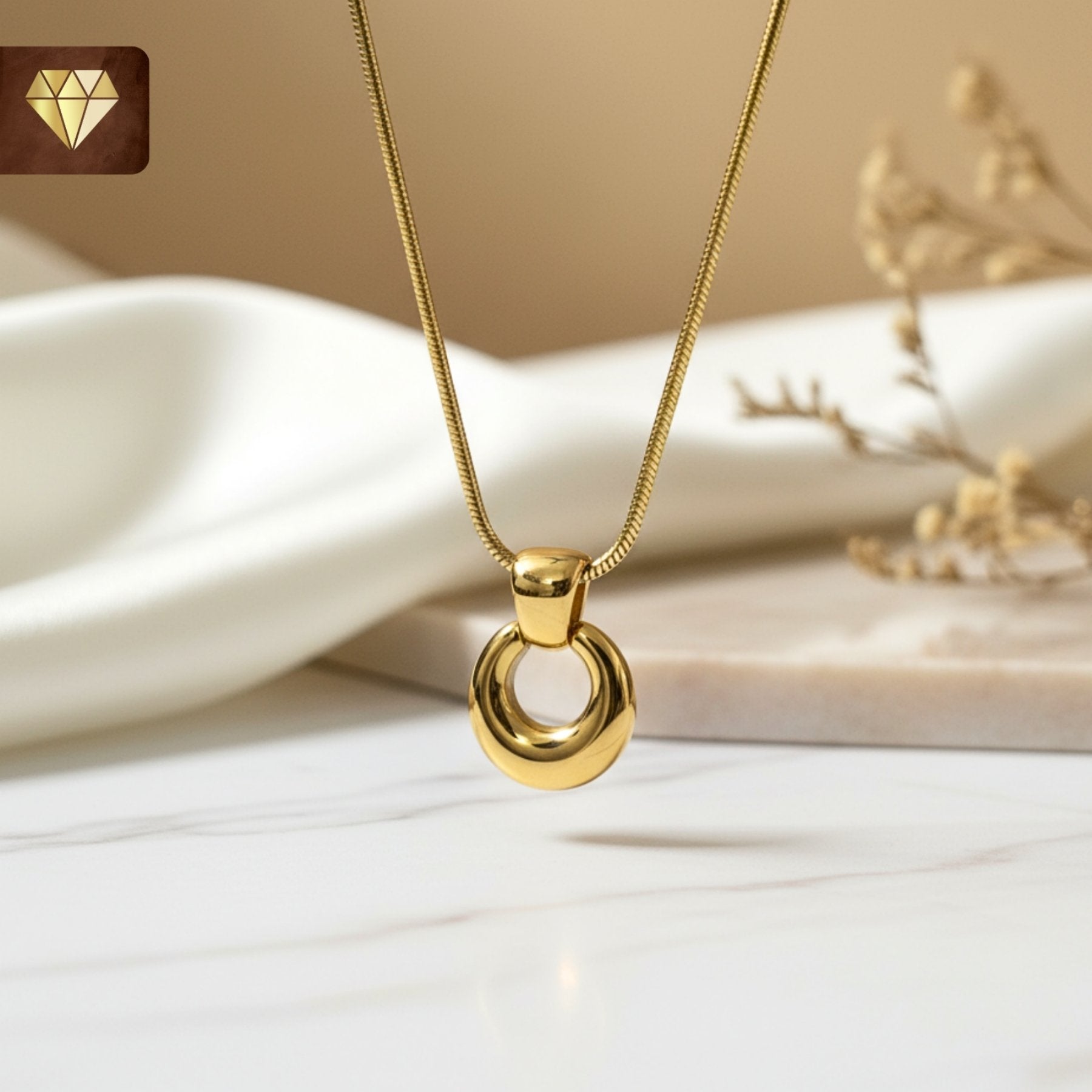 Minimalist gold-plated donut circular pendant necklace with smooth high-polish finish for women