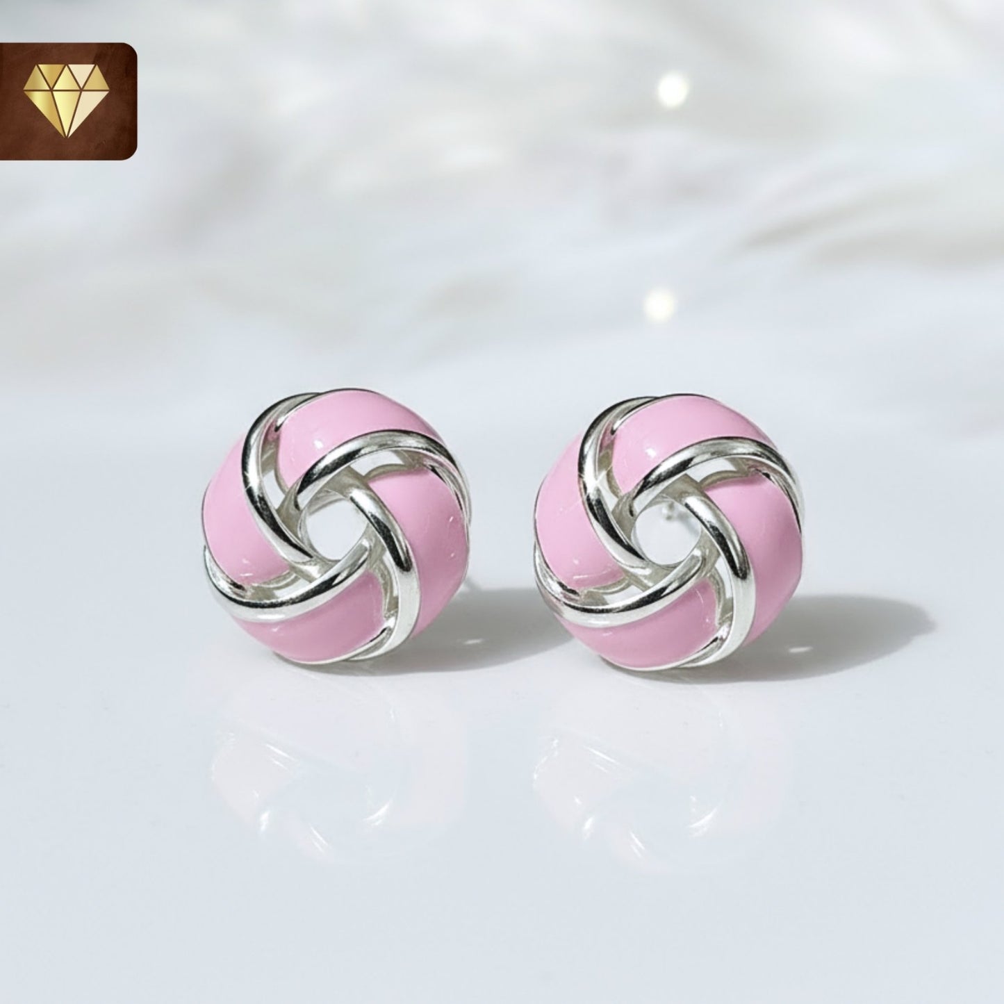 Silver-plated pink enamel knot stud earrings – vintage-inspired pastel jewelry for women