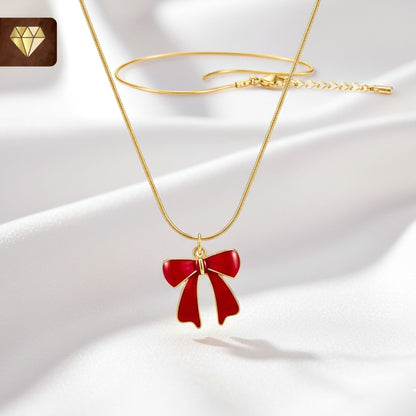 old-plated red enamel bow pendant necklace on snake chain – cute ribbon charm jewelry for women