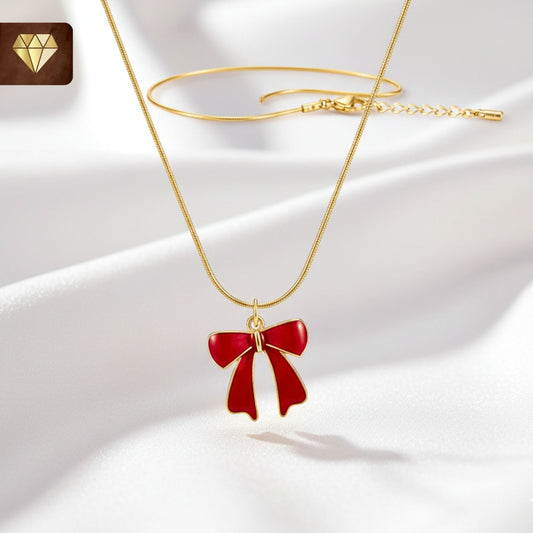 old-plated red enamel bow pendant necklace on snake chain – cute ribbon charm jewelry for women