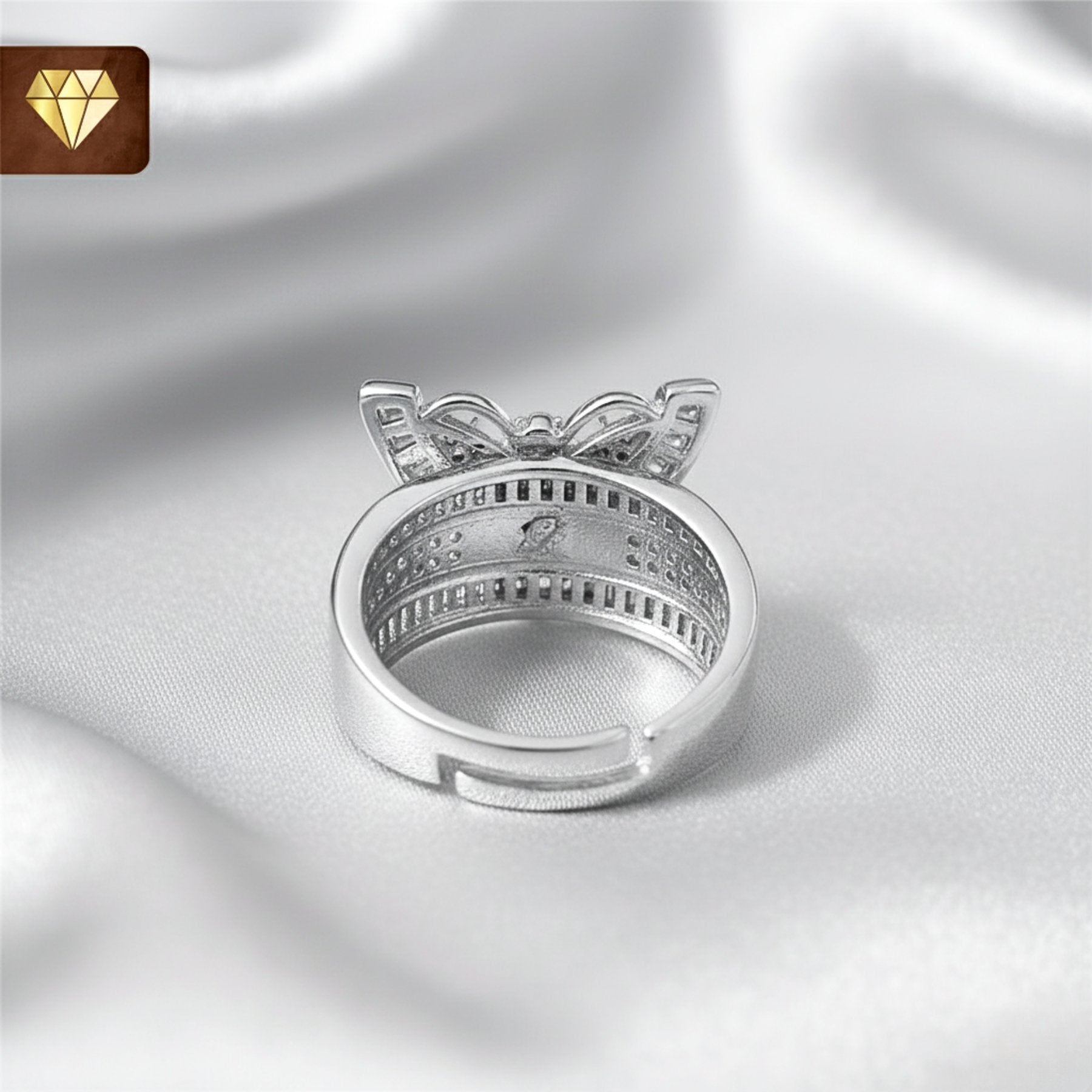 Silver butterfly finger ring with AD (American Diamond) CZ baguette and pave stones for women
